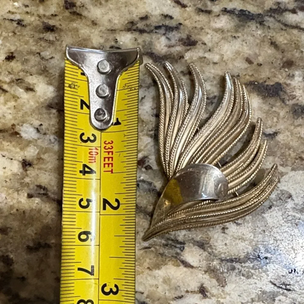 Chic Gold and Silver Flowing Brooch